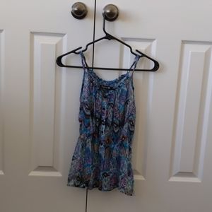 A flowing spaghetti strap blouse